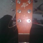 Réparation d'une rosace sur une guitare art&lutherie